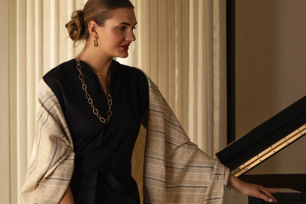 scarf on model with cream and fringe