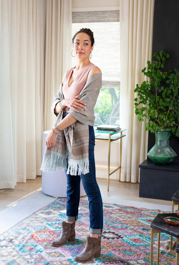 On model scarf with blue fringe 