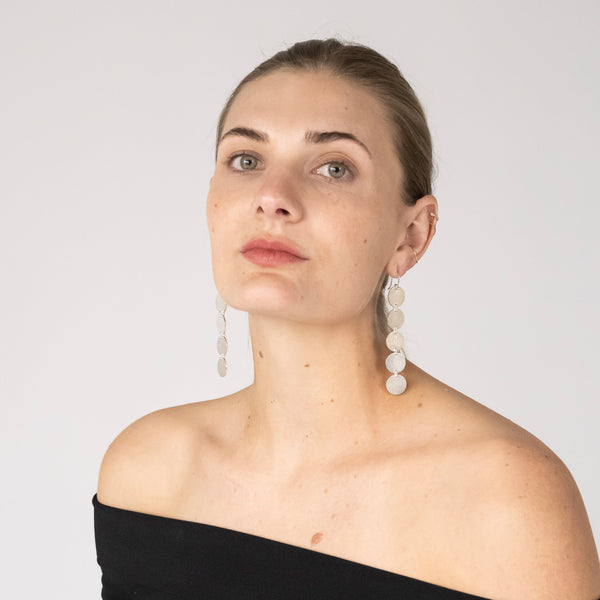 long sterling silver earings on model 
