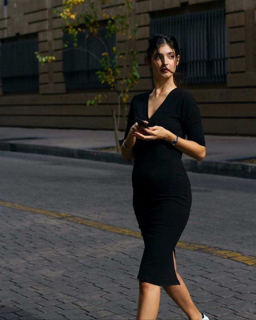 on model black v neck dress mid knee