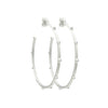 Sterling Silver earrings close up shot of textured finish and raised beading 